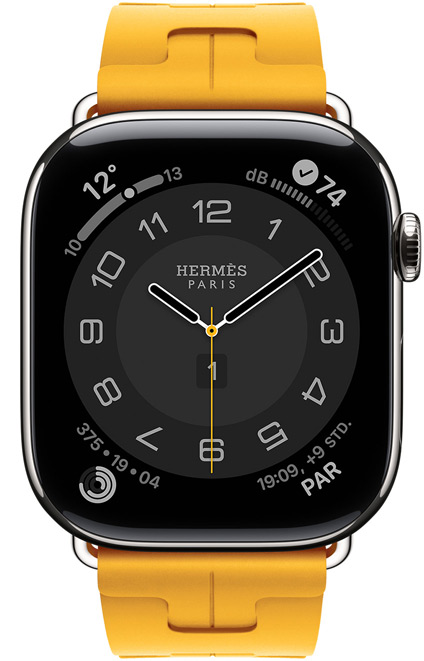 Apple Watch Hermès Series 11, Circulaire Zifferblatt (Stunden-, Minuten- und Sekundenzeiger, Hermès Paris Logo, Komplikationen: Wetter, Aktivit?tsringe, Paris Zeit und UV Index), Titangeh?use, Farbe Silber, rechte Seite, Digital Crown, kombiniert mit Kilim Single Tour Armband, Farbe Jaune (Kanariengelb), Material aus Fluorelastomergummi