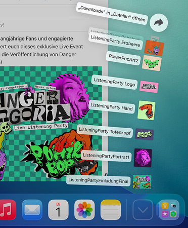 Nahaufnahme des Docks am unteren Bildschirmrand mit einer Reihe von Dateien, die nach oben aus dem Dock herausgef?chert werden