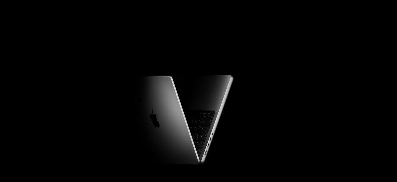V字の形に配置されたMacBook Pro。M5チップファミリーを表現(xiàn)している