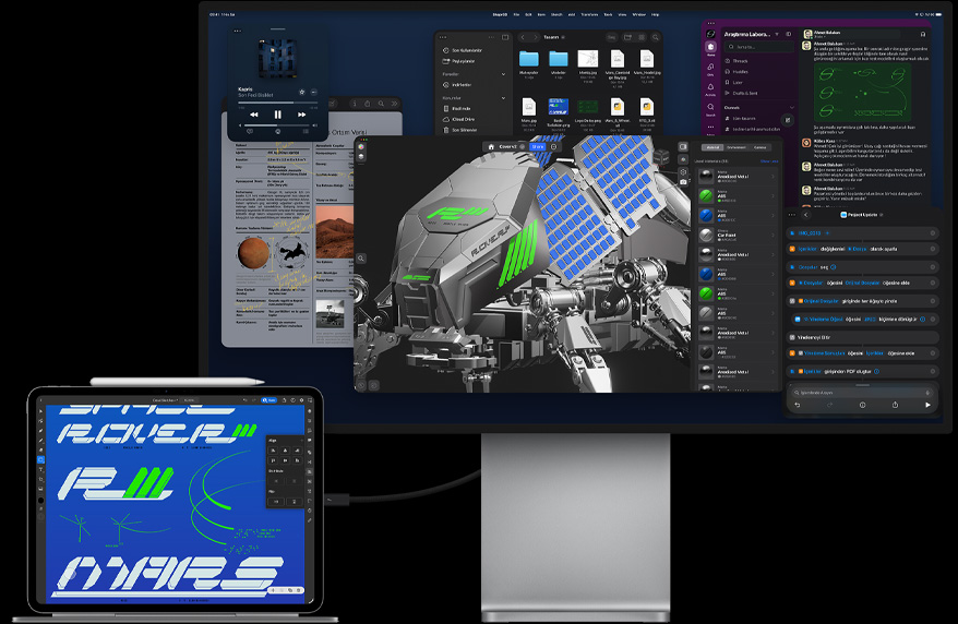 Magic Keyboard’a tak?l? iPad Pro, ?nden d?? g?rünüm, tüm ayg?tlar harici Mac Studio Display’e ba?l?, iPad Pro ekran?nda grafik tasar?m uygulamas?, canl? renkler ve metinler g?steriliyor, Studio Display’de ?e?itli uygulamalar ve bir 3D model g?steriliyor
