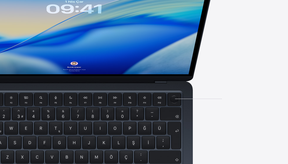 Touch ID dü?mesinin g?sterildi?i a??k bir MacBook Air