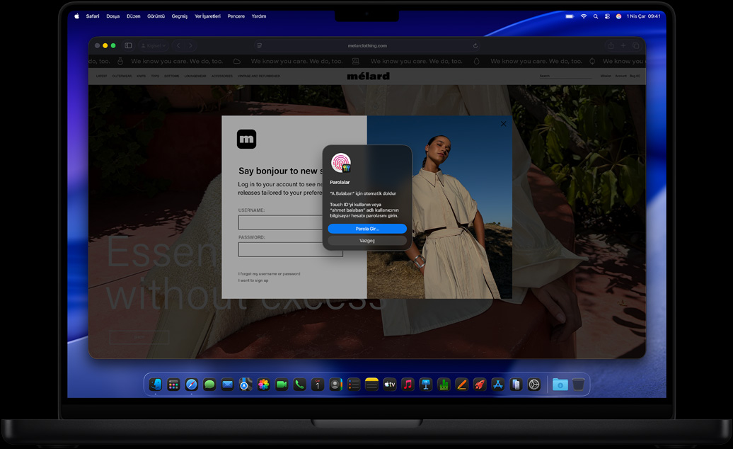 Bir kullan?c?n?n Safari’de gezinirken bir web sitesine giri? yapmak i?in Touch ID kullanma bildirimi ald??? g?rülüyor
