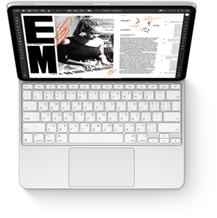 iPad Pro 搭配適用於 iPad Pro 的白色巧控鍵盤的俯視圖。