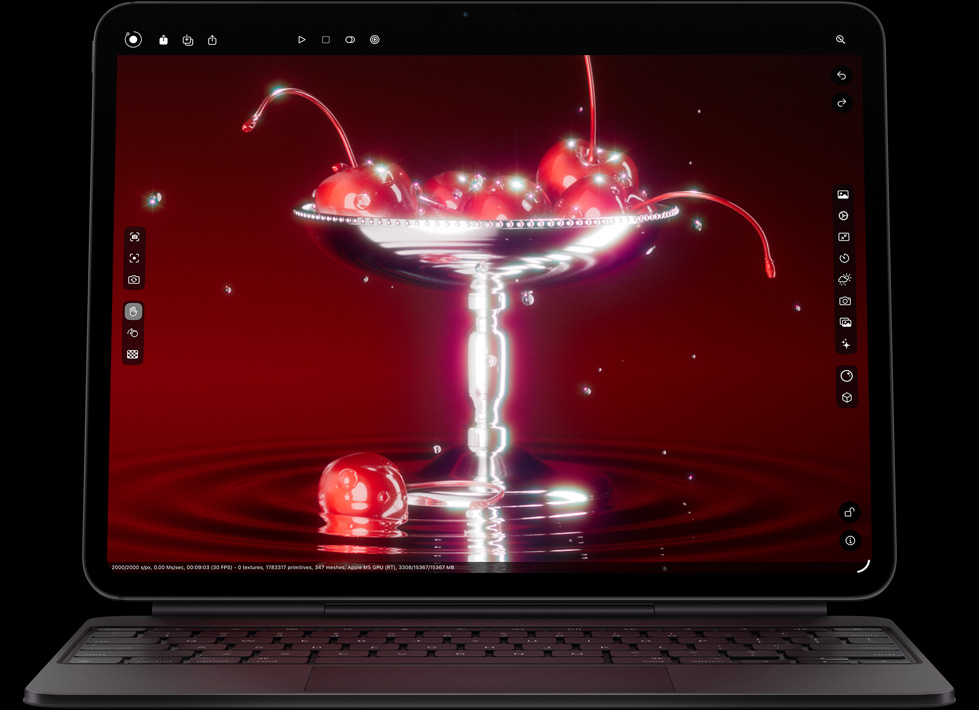 iPad Pro, posición horizontal, parte delantera exterior, color negro espacial, esquinas redondeadas, bisel de pantalla negro, acoplado a un Magic Keyboard en posición horizontal, parte delantera exterior en color negro, la pantalla muestra una app de edición de fotos con una imagen brillante de cerezas en un cuenco con forma de copa de martini y gotas de agua