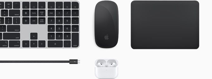 Auswahl an Zubeh?r mit Magic Keyboard, Magic Mouse, Magic Trackpad, Thunderbolt 4 Pro Kabel und AirPods Pro.